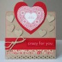 Tarjeta de San Valentin llena de corazones rojos y rosas Tarjeta de San Valentin llena de corazones rojos y rosas de materiales reciclados